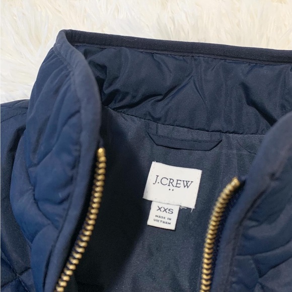 Jcrew navy puffer vest with snap pockets - Picture 3 of 7